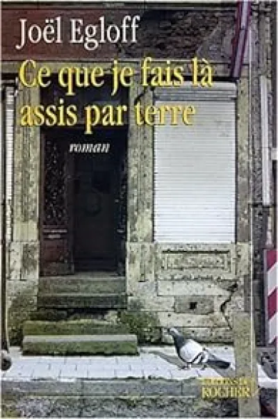 Ce que je fais là, assis par terre